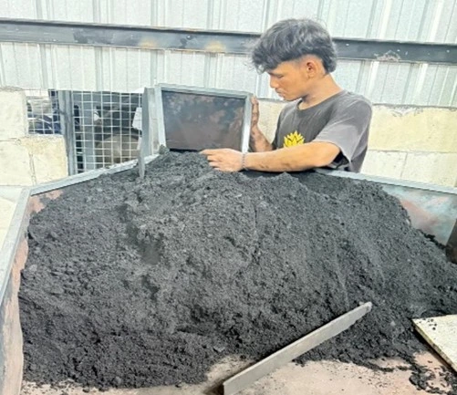 Mixing process for charcoal briquette material